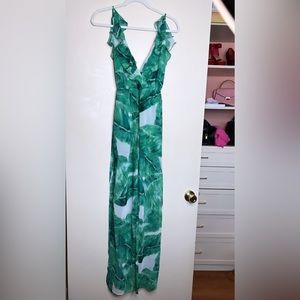 Jlo and Miami vibes with this jumpsuit. Color green new with tags.